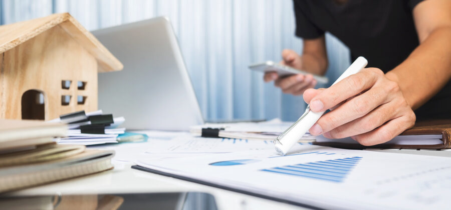 title agent working on title search in a title company