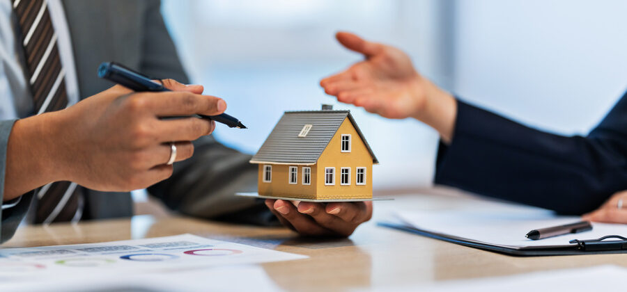 title insurance agent in meeting with a client